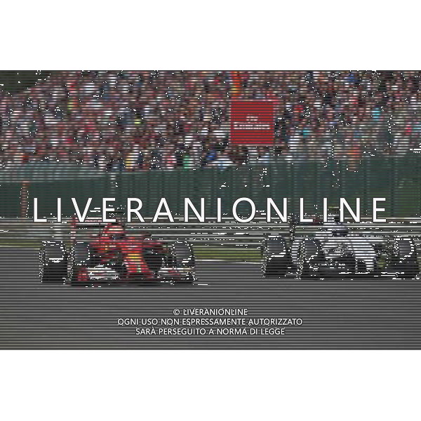 Kimi Raikkonen (FIN) Ferrari F14-T and Valtteri Bottas (FIN) Williams FW36 battle for position. 24.08.2014. Formula 1 World Championship, Rd 12, Belgian Grand Prix, Spa Francorchamps, Belgium, Race Day. AG ALDO LIVERANI SAS ONLY ITALY