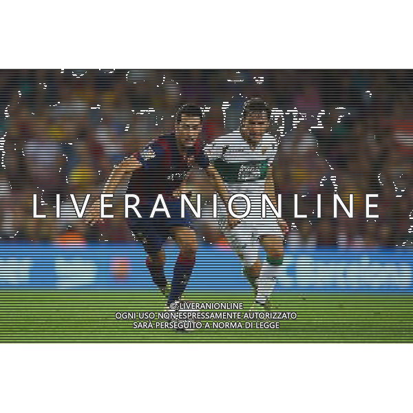 Sergio Busquets / Pedro Mosquera - 24.08.2014 - Barcelone / Elche - 1ere journee Liga Photo : Aop press / Icon Sport /Agenzia Aldo Liverani sas - ITALY ONLY - EDITORIAL USE ONLY