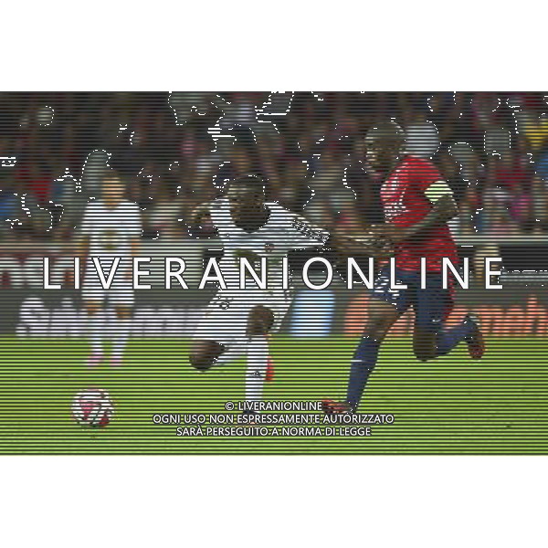 Gilles SUNU / Rio MAVUBA - 23.08.2014 - Lille / Lorient - 3eme journee Ligue 1 Photo : Dave Winter / Icon Sport /Agenzia Aldo Liverani sas - ITALY ONLY - EDITORIAL USE ONLY