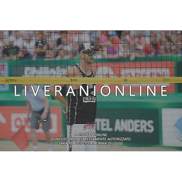 24.08.2014 - Stare Jablonki , siatkowka plazowa , beach volleyball , World Tour , FIVB Stare Jablonki Grand Slam 2014 , USA (niebieskie) - Austria (czarne) , USA (blue) - Austria (black) N/Z Clemens Doppler Fot. Karol Bartnik / MPAimages.com/NEWSPIX.PL --- Newspix.pl /Agenzia Aldo Liverani sas - ITALY ONLY - EDITORIAL USE ONLY - BEACHVOLLEY *** Local Caption *** www.newspix.pl mail us: info@newspix.pl call us: 0048 022 23 22 222 --- Polish Picture Agency by Ringier Axel Springer Poland