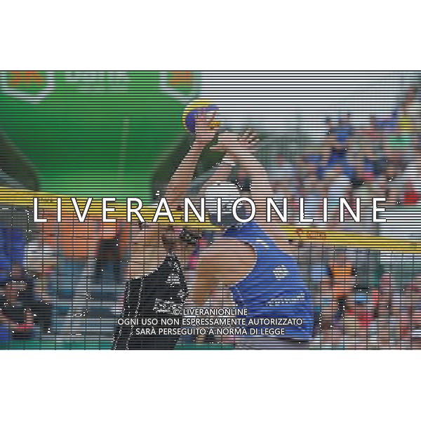 24.08.2014 - Stare Jablonki , siatkowka plazowa , beach volleyball , World Tour , FIVB Stare Jablonki Grand Slam 2014 , USA (niebieskie) - Austria (czarne) , USA (blue) - Austria (black) N/Z Clemens Doppler , Jacob Gibb Fot. Karol Bartnik / MPAimages.com/NEWSPIX.PL --- Newspix.pl /Agenzia Aldo Liverani sas - ITALY ONLY - EDITORIAL USE ONLY - BEACHVOLLEY *** Local Caption *** www.newspix.pl mail us: info@newspix.pl call us: 0048 022 23 22 222 --- Polish Picture Agency by Ringier Axel Springer Poland