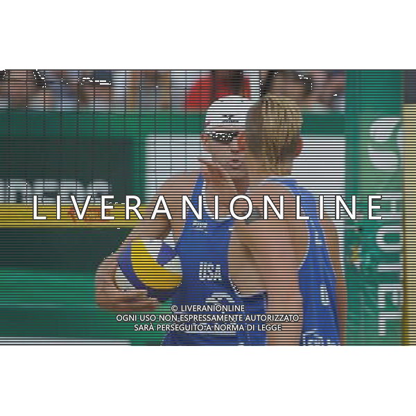 24.08.2014 - Stare Jablonki , siatkowka plazowa , beach volleyball , World Tour , FIVB Stare Jablonki Grand Slam 2014 , USA (niebieskie) - Austria (czarne) , USA (blue) - Austria (black) N/Z Jacob Gibb , Casey Patterson Fot. Karol Bartnik / MPAimages.com/NEWSPIX.PL --- Newspix.pl /Agenzia Aldo Liverani sas - ITALY ONLY - EDITORIAL USE ONLY - BEACHVOLLEY *** Local Caption *** www.newspix.pl mail us: info@newspix.pl call us: 0048 022 23 22 222 --- Polish Picture Agency by Ringier Axel Springer Poland