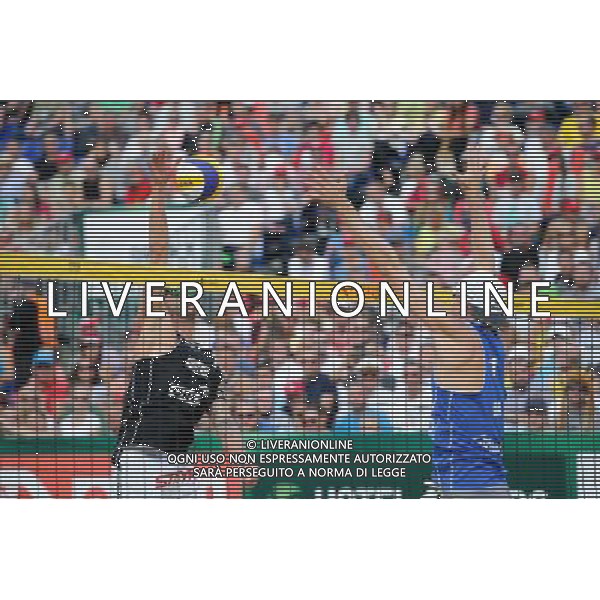 24.08.2014 - Stare Jablonki , siatkowka plazowa , beach volleyball , World Tour , FIVB Stare Jablonki Grand Slam 2014 , USA (niebieskie) - Austria (czarne) , USA (blue) - Austria (black) N/Z Clemens Doppler , Jacob Gibb Fot. Karol Bartnik / MPAimages.com/NEWSPIX.PL --- Newspix.pl /Agenzia Aldo Liverani sas - ITALY ONLY - EDITORIAL USE ONLY - BEACHVOLLEY *** Local Caption *** www.newspix.pl mail us: info@newspix.pl call us: 0048 022 23 22 222 --- Polish Picture Agency by Ringier Axel Springer Poland
