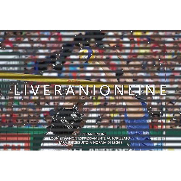 24.08.2014 - Stare Jablonki , siatkowka plazowa , beach volleyball , World Tour , FIVB Stare Jablonki Grand Slam 2014 , USA (niebieskie) - Austria (czarne) , USA (blue) - Austria (black) N/Z Clemens Doppler , Jacob Gibb Fot. Karol Bartnik / MPAimages.com/NEWSPIX.PL --- Newspix.pl /Agenzia Aldo Liverani sas - ITALY ONLY - EDITORIAL USE ONLY - BEACHVOLLEY *** Local Caption *** www.newspix.pl mail us: info@newspix.pl call us: 0048 022 23 22 222 --- Polish Picture Agency by Ringier Axel Springer Poland