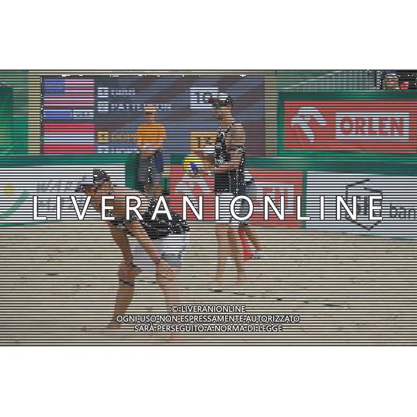 24.08.2014 - Stare Jablonki , siatkowka plazowa , beach volleyball , World Tour , FIVB Stare Jablonki Grand Slam 2014 , USA (niebieskie) - Austria (czarne) , USA (blue) - Austria (black) N/Z Alexander Horst , Clemens Doppler Fot. Karol Bartnik / MPAimages.com/NEWSPIX.PL --- Newspix.pl /Agenzia Aldo Liverani sas - ITALY ONLY - EDITORIAL USE ONLY - BEACHVOLLEY *** Local Caption *** www.newspix.pl mail us: info@newspix.pl call us: 0048 022 23 22 222 --- Polish Picture Agency by Ringier Axel Springer Poland