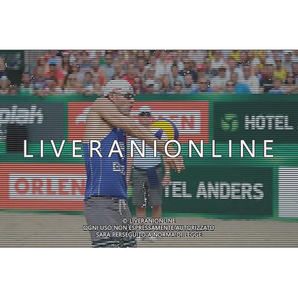 24.08.2014 - Stare Jablonki , siatkowka plazowa , beach volleyball , World Tour , FIVB Stare Jablonki Grand Slam 2014 , USA (niebieskie) - Austria (czarne) , USA (blue) - Austria (black) N/Z Jacob Gibb Fot. Karol Bartnik / MPAimages.com/NEWSPIX.PL --- Newspix.pl /Agenzia Aldo Liverani sas - ITALY ONLY - EDITORIAL USE ONLY - BEACHVOLLEY *** Local Caption *** www.newspix.pl mail us: info@newspix.pl call us: 0048 022 23 22 222 --- Polish Picture Agency by Ringier Axel Springer Poland