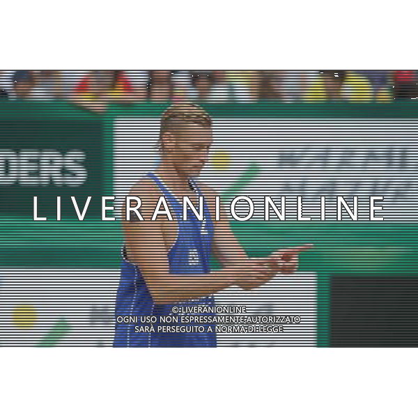 24.08.2014 - Stare Jablonki , siatkowka plazowa , beach volleyball , World Tour , FIVB Stare Jablonki Grand Slam 2014 , USA (niebieskie) - Austria (czarne) , USA (blue) - Austria (black) N/Z Casey Patterson Fot. Karol Bartnik / MPAimages.com/NEWSPIX.PL --- Newspix.pl /Agenzia Aldo Liverani sas - ITALY ONLY - EDITORIAL USE ONLY - BEACHVOLLEY *** Local Caption *** www.newspix.pl mail us: info@newspix.pl call us: 0048 022 23 22 222 --- Polish Picture Agency by Ringier Axel Springer Poland