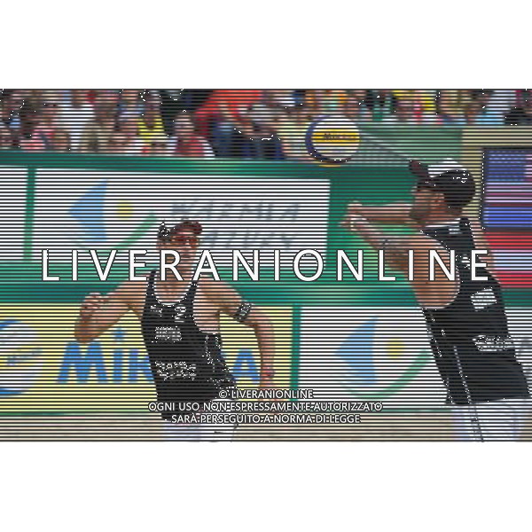 24.08.2014 - Stare Jablonki , siatkowka plazowa , beach volleyball , World Tour , FIVB Stare Jablonki Grand Slam 2014 , USA (niebieskie) - Austria (czarne) , USA (blue) - Austria (black) N/Z Alexander Horst , Clemens Doppler Fot. Karol Bartnik / MPAimages.com/NEWSPIX.PL --- Newspix.pl /Agenzia Aldo Liverani sas - ITALY ONLY - EDITORIAL USE ONLY - BEACHVOLLEY *** Local Caption *** www.newspix.pl mail us: info@newspix.pl call us: 0048 022 23 22 222 --- Polish Picture Agency by Ringier Axel Springer Poland