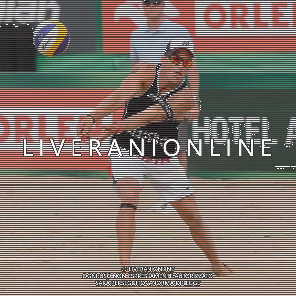 24.08.2014 - Stare Jablonki , siatkowka plazowa , beach volleyball , World Tour , FIVB Stare Jablonki Grand Slam 2014 , USA (granatowe) - Austria (czarne) , USA - Austria N/Z Alexander Horst Fot. Mariusz Palczynski / MPAimages.com/NEWSPIX.PL --- Newspix.pl /Agenzia Aldo Liverani sas - ITALY ONLY - EDITORIAL USE ONLY - BEACHVOLLEY *** Local Caption *** www.newspix.pl mail us: info@newspix.pl call us: 0048 022 23 22 222 --- Polish Picture Agency by Ringier Axel Springer Poland