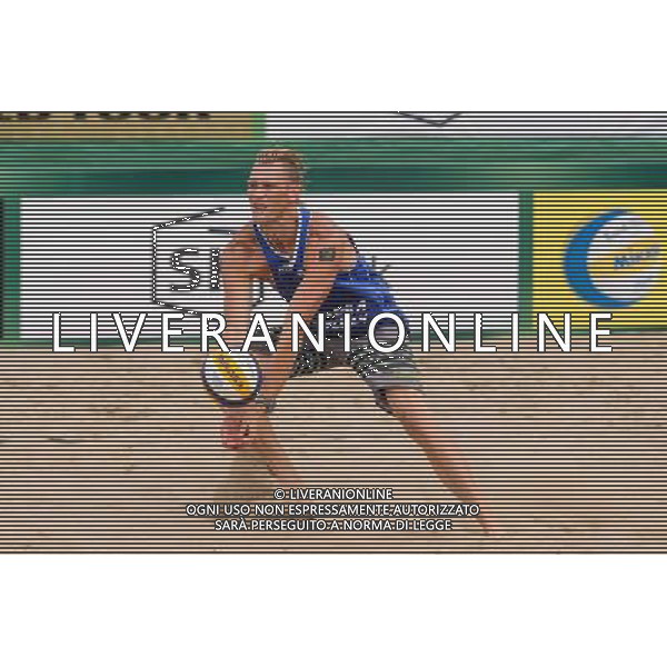 24.08.2014 - Stare Jablonki , siatkowka plazowa , beach volleyball , World Tour , FIVB Stare Jablonki Grand Slam 2014 , USA (granatowe) - Austria (czarne) , USA - Austria N/Z Casey Patterson Fot. Mariusz Palczynski / MPAimages.com/NEWSPIX.PL --- Newspix.pl /Agenzia Aldo Liverani sas - ITALY ONLY - EDITORIAL USE ONLY - BEACHVOLLEY *** Local Caption *** www.newspix.pl mail us: info@newspix.pl call us: 0048 022 23 22 222 --- Polish Picture Agency by Ringier Axel Springer Poland