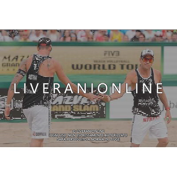 24.08.2014 - Stare Jablonki , siatkowka plazowa , beach volleyball , World Tour , FIVB Stare Jablonki Grand Slam 2014 , USA (granatowe) - Austria (czarne) , USA - Austria N/Z Clemens Doppler , Aleksander Horst Fot. Mariusz Palczynski / MPAimages.com/NEWSPIX.PL --- Newspix.pl /Agenzia Aldo Liverani sas - ITALY ONLY - EDITORIAL USE ONLY - BEACHVOLLEY *** Local Caption *** www.newspix.pl mail us: info@newspix.pl call us: 0048 022 23 22 222 --- Polish Picture Agency by Ringier Axel Springer Poland