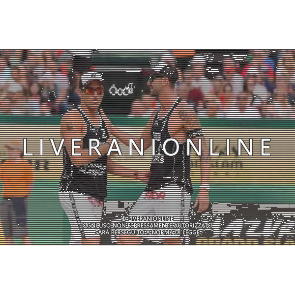 24.08.2014 - Stare Jablonki , siatkowka plazowa , beach volleyball , World Tour , FIVB Stare Jablonki Grand Slam 2014 , USA (granatowe) - Austria (czarne) , USA - Austria N/Z Alexander Horst , Clemens Doppler Fot. Mariusz Palczynski / MPAimages.com/NEWSPIX.PL --- Newspix.pl /Agenzia Aldo Liverani sas - ITALY ONLY - EDITORIAL USE ONLY - BEACHVOLLEY *** Local Caption *** www.newspix.pl mail us: info@newspix.pl call us: 0048 022 23 22 222 --- Polish Picture Agency by Ringier Axel Springer Poland