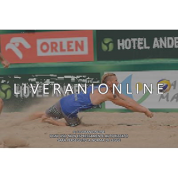 24.08.2014 - Stare Jablonki , siatkowka plazowa , beach volleyball , World Tour , FIVB Stare Jablonki Grand Slam 2014 , USA (granatowe) - Austria (czarne) , USA - Austria N/Z Casey Patterson Fot. Mariusz Palczynski / MPAimages.com/NEWSPIX.PL --- Newspix.pl /Agenzia Aldo Liverani sas - ITALY ONLY - EDITORIAL USE ONLY - BEACHVOLLEY *** Local Caption *** www.newspix.pl mail us: info@newspix.pl call us: 0048 022 23 22 222 --- Polish Picture Agency by Ringier Axel Springer Poland