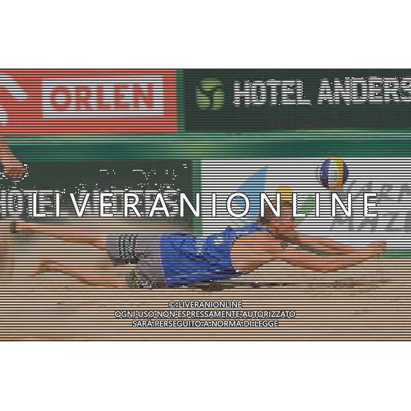 24.08.2014 - Stare Jablonki , siatkowka plazowa , beach volleyball , World Tour , FIVB Stare Jablonki Grand Slam 2014 , USA (granatowe) - Austria (czarne) , USA - Austria N/Z Casey Patterson Fot. Mariusz Palczynski / MPAimages.com/NEWSPIX.PL --- Newspix.pl /Agenzia Aldo Liverani sas - ITALY ONLY - EDITORIAL USE ONLY - BEACHVOLLEY *** Local Caption *** www.newspix.pl mail us: info@newspix.pl call us: 0048 022 23 22 222 --- Polish Picture Agency by Ringier Axel Springer Poland