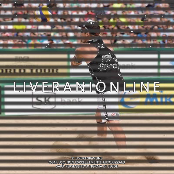 24.08.2014 - Stare Jablonki , siatkowka plazowa , beach volleyball , World Tour , FIVB Stare Jablonki Grand Slam 2014 , USA (granatowe) - Austria (czarne) , USA - Austria N/Z Alexander Horst Fot. Mariusz Palczynski / MPAimages.com/NEWSPIX.PL --- Newspix.pl /Agenzia Aldo Liverani sas - ITALY ONLY - EDITORIAL USE ONLY - BEACHVOLLEY *** Local Caption *** www.newspix.pl mail us: info@newspix.pl call us: 0048 022 23 22 222 --- Polish Picture Agency by Ringier Axel Springer Poland