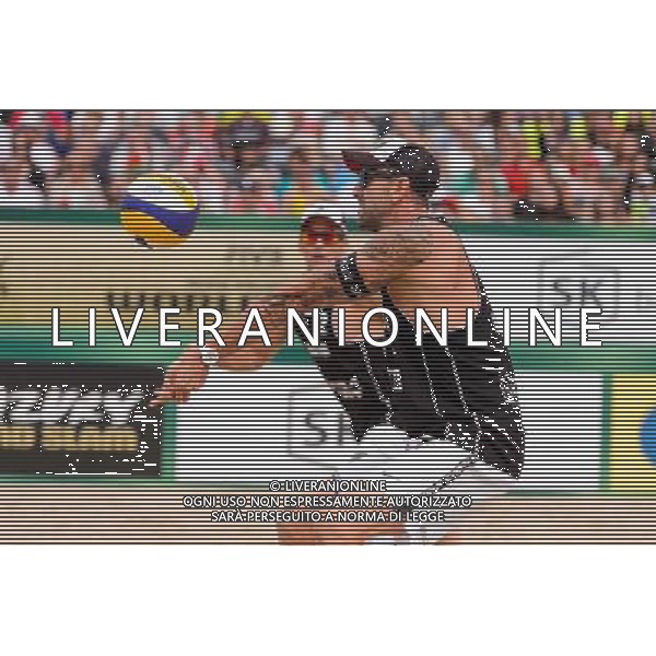 24.08.2014 - Stare Jablonki , siatkowka plazowa , beach volleyball , World Tour , FIVB Stare Jablonki Grand Slam 2014 , USA (granatowe) - Austria (czarne) , USA - Austria N/Z Clemens Doppler Fot. Mariusz Palczynski / MPAimages.com/NEWSPIX.PL --- Newspix.pl /Agenzia Aldo Liverani sas - ITALY ONLY - EDITORIAL USE ONLY - BEACHVOLLEY *** Local Caption *** www.newspix.pl mail us: info@newspix.pl call us: 0048 022 23 22 222 --- Polish Picture Agency by Ringier Axel Springer Poland