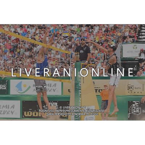 24.08.2014 - Stare Jablonki , siatkowka plazowa , beach volleyball , World Tour , FIVB Stare Jablonki Grand Slam 2014 , USA (granatowe) - Austria (czarne) , USA - Austria N/Z Jacob Gibb , Clemens Doppler Fot. Mariusz Palczynski / MPAimages.com/NEWSPIX.PL --- Newspix.pl /Agenzia Aldo Liverani sas - ITALY ONLY - EDITORIAL USE ONLY - BEACHVOLLEY *** Local Caption *** www.newspix.pl mail us: info@newspix.pl call us: 0048 022 23 22 222 --- Polish Picture Agency by Ringier Axel Springer Poland