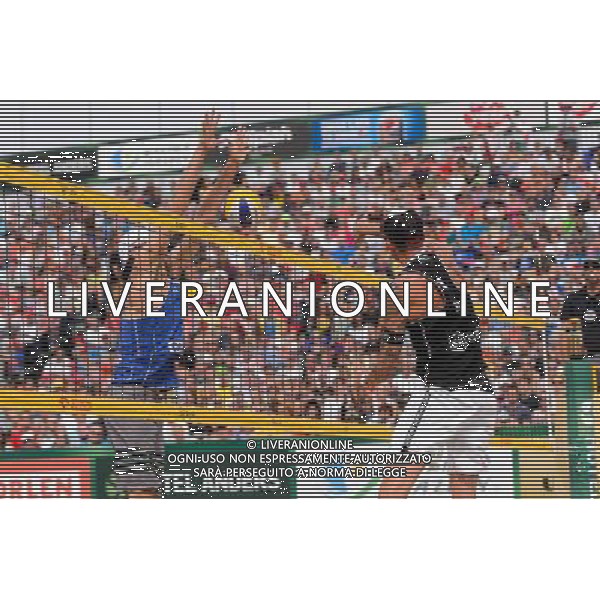 24.08.2014 - Stare Jablonki , siatkowka plazowa , beach volleyball , World Tour , FIVB Stare Jablonki Grand Slam 2014 , USA (granatowe) - Austria (czarne) , USA - Austria N/Z Jacob Gibb , Clemens Doppler Fot. Mariusz Palczynski / MPAimages.com/NEWSPIX.PL --- Newspix.pl /Agenzia Aldo Liverani sas - ITALY ONLY - EDITORIAL USE ONLY - BEACHVOLLEY *** Local Caption *** www.newspix.pl mail us: info@newspix.pl call us: 0048 022 23 22 222 --- Polish Picture Agency by Ringier Axel Springer Poland