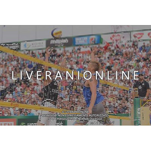 24.08.2014 - Stare Jablonki , siatkowka plazowa , beach volleyball , World Tour , FIVB Stare Jablonki Grand Slam 2014 , USA (granatowe) - Austria (czarne) , USA - Austria N/Z Clemens Doppler , Casey Patterson Fot. Mariusz Palczynski / MPAimages.com/NEWSPIX.PL --- Newspix.pl /Agenzia Aldo Liverani sas - ITALY ONLY - EDITORIAL USE ONLY - BEACHVOLLEY *** Local Caption *** www.newspix.pl mail us: info@newspix.pl call us: 0048 022 23 22 222 --- Polish Picture Agency by Ringier Axel Springer Poland