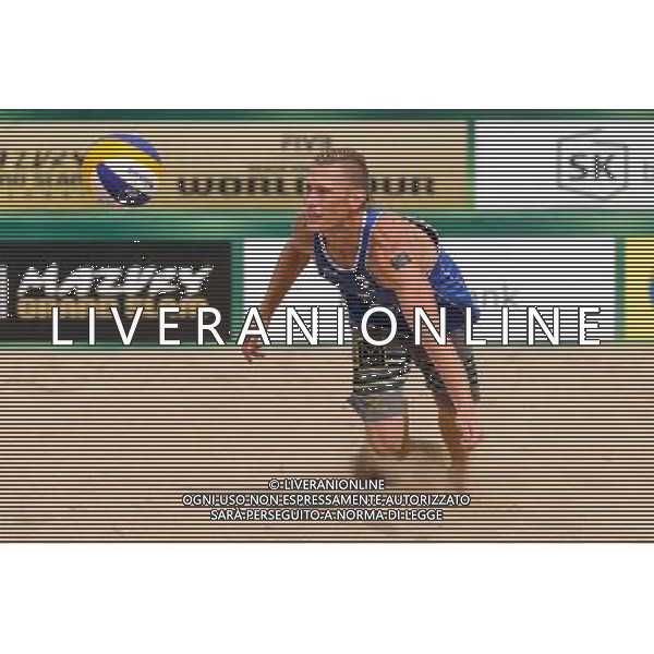 24.08.2014 - Stare Jablonki , siatkowka plazowa , beach volleyball , World Tour , FIVB Stare Jablonki Grand Slam 2014 , USA (granatowe) - Austria (czarne) , USA - Austria N/Z Casey Patterson Fot. Mariusz Palczynski / MPAimages.com/NEWSPIX.PL --- Newspix.pl /Agenzia Aldo Liverani sas - ITALY ONLY - EDITORIAL USE ONLY - BEACHVOLLEY *** Local Caption *** www.newspix.pl mail us: info@newspix.pl call us: 0048 022 23 22 222 --- Polish Picture Agency by Ringier Axel Springer Poland