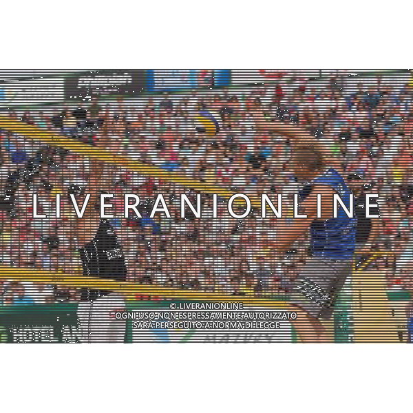 24.08.2014 - Stare Jablonki , siatkowka plazowa , beach volleyball , World Tour , FIVB Stare Jablonki Grand Slam 2014 , USA (granatowe) - Austria (czarne) , USA - Austria N/Z Clemens Doppler , Casey Patterson Fot. Mariusz Palczynski / MPAimages.com/NEWSPIX.PL --- Newspix.pl /Agenzia Aldo Liverani sas - ITALY ONLY - EDITORIAL USE ONLY - BEACHVOLLEY *** Local Caption *** www.newspix.pl mail us: info@newspix.pl call us: 0048 022 23 22 222 --- Polish Picture Agency by Ringier Axel Springer Poland