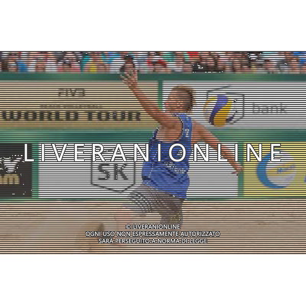 24.08.2014 - Stare Jablonki , siatkowka plazowa , beach volleyball , World Tour , FIVB Stare Jablonki Grand Slam 2014 , USA (granatowe) - Austria (czarne) , USA - Austria N/Z Casey Patterson Fot. Mariusz Palczynski / MPAimages.com/NEWSPIX.PL --- Newspix.pl /Agenzia Aldo Liverani sas - ITALY ONLY - EDITORIAL USE ONLY - BEACHVOLLEY *** Local Caption *** www.newspix.pl mail us: info@newspix.pl call us: 0048 022 23 22 222 --- Polish Picture Agency by Ringier Axel Springer Poland