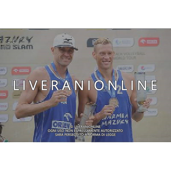 24.08.2014 - Stare Jablonki , siatkowka plazowa , beach volleyball , World Tour , FIVB Stare Jablonki Grand Slam 2014 , Dekoracja N/Z Jacob Gibb , Casey Patterson Fot. Karol Bartnik / MPAimages.com/NEWSPIX.PL --- Newspix.pl /Agenzia Aldo Liverani sas - ITALY ONLY - EDITORIAL USE ONLY - BEACHVOLLEY PREMIAZIONI *** Local Caption *** www.newspix.pl mail us: info@newspix.pl call us: 0048 022 23 22 222 --- Polish Picture Agency by Ringier Axel Springer Poland