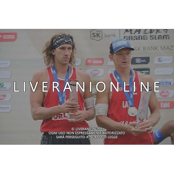 24.08.2014 - Stare Jablonki , siatkowka plazowa , beach volleyball , World Tour , FIVB Stare Jablonki Grand Slam 2014 , Dekoracja N/Z Aleksandrs Samoilovs , Janis Smedins Fot. Karol Bartnik / MPAimages.com/NEWSPIX.PL --- Newspix.pl /Agenzia Aldo Liverani sas - ITALY ONLY - EDITORIAL USE ONLY - BEACHVOLLEY PREMIAZIONI *** Local Caption *** www.newspix.pl mail us: info@newspix.pl call us: 0048 022 23 22 222 --- Polish Picture Agency by Ringier Axel Springer Poland