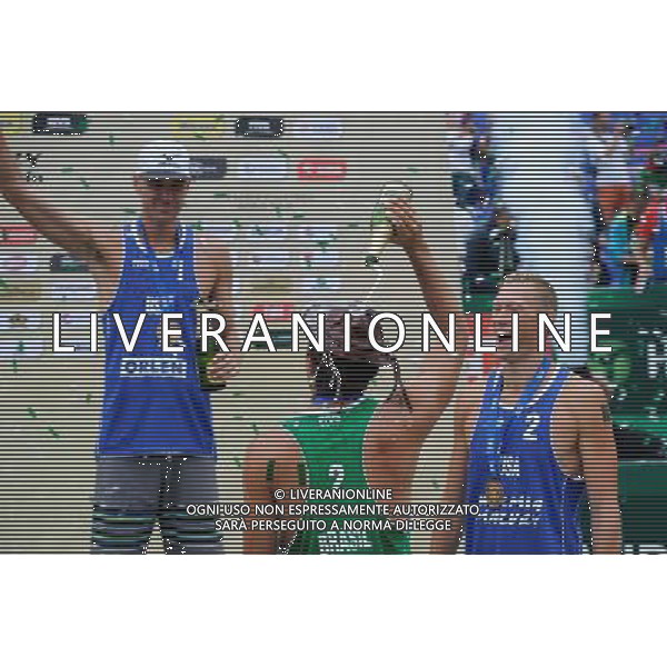 24.08.2014 - Stare Jablonki , siatkowka plazowa , beach volleyball , World Tour , FIVB Stare Jablonki Grand Slam 2014 , Dekoracja N/Z Jacob Gibb , Alvaro Morais Filho , Casey Patterson Fot. Karol Bartnik / MPAimages.com/NEWSPIX.PL --- Newspix.pl /Agenzia Aldo Liverani sas - ITALY ONLY - EDITORIAL USE ONLY - BEACHVOLLEY PREMIAZIONI *** Local Caption *** www.newspix.pl mail us: info@newspix.pl call us: 0048 022 23 22 222 --- Polish Picture Agency by Ringier Axel Springer Poland