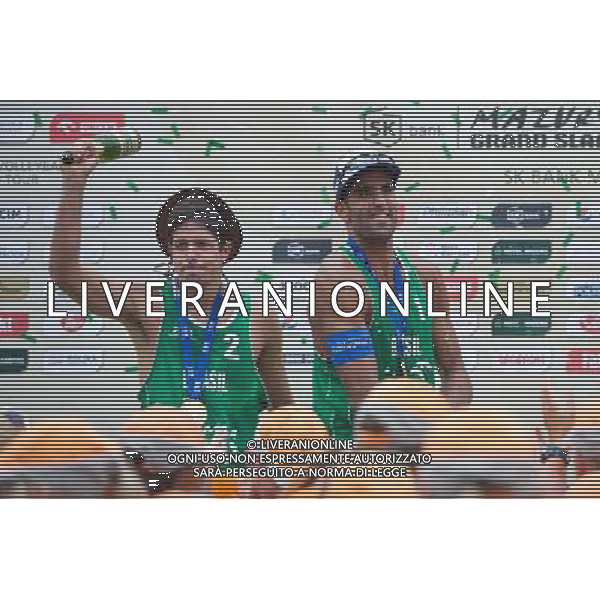 24.08.2014 - Stare Jablonki , siatkowka plazowa , beach volleyball , World Tour , FIVB Stare Jablonki Grand Slam 2014 , Dekoracja N/Z Alvaro Morais Filho , Perdo Solberg Salgado Fot. Karol Bartnik / MPAimages.com/NEWSPIX.PL --- Newspix.pl /Agenzia Aldo Liverani sas - ITALY ONLY - EDITORIAL USE ONLY - BEACHVOLLEY PREMIAZIONI *** Local Caption *** www.newspix.pl mail us: info@newspix.pl call us: 0048 022 23 22 222 --- Polish Picture Agency by Ringier Axel Springer Poland