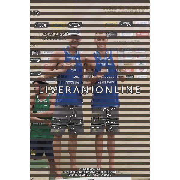 24.08.2014 - Stare Jablonki , siatkowka plazowa , beach volleyball , World Tour , FIVB Stare Jablonki Grand Slam 2014 , Dekoracja mezczyzn N/Z Jacob Gibb , Casey Patterson Fot. Mariusz Palczynski / MPAimages.com/NEWSPIX.PL --- Newspix.pl /Agenzia Aldo Liverani sas - ITALY ONLY - EDITORIAL USE ONLY - BEACHVOLLEY PREMIAZIONI *** Local Caption *** www.newspix.pl mail us: info@newspix.pl call us: 0048 022 23 22 222 --- Polish Picture Agency by Ringier Axel Springer Poland