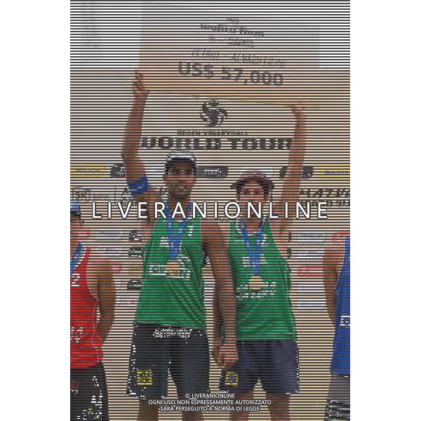 24.08.2014 - Stare Jablonki , siatkowka plazowa , beach volleyball , World Tour , FIVB Stare Jablonki Grand Slam 2014 , Dekoracja mezczyzn N/Z Pedro Solberg Salgado , Alvaro Morais Filho Fot. Mariusz Palczynski / MPAimages.com/NEWSPIX.PL --- Newspix.pl /Agenzia Aldo Liverani sas - ITALY ONLY - EDITORIAL USE ONLY - BEACHVOLLEY PREMIAZIONI *** Local Caption *** www.newspix.pl mail us: info@newspix.pl call us: 0048 022 23 22 222 --- Polish Picture Agency by Ringier Axel Springer Poland