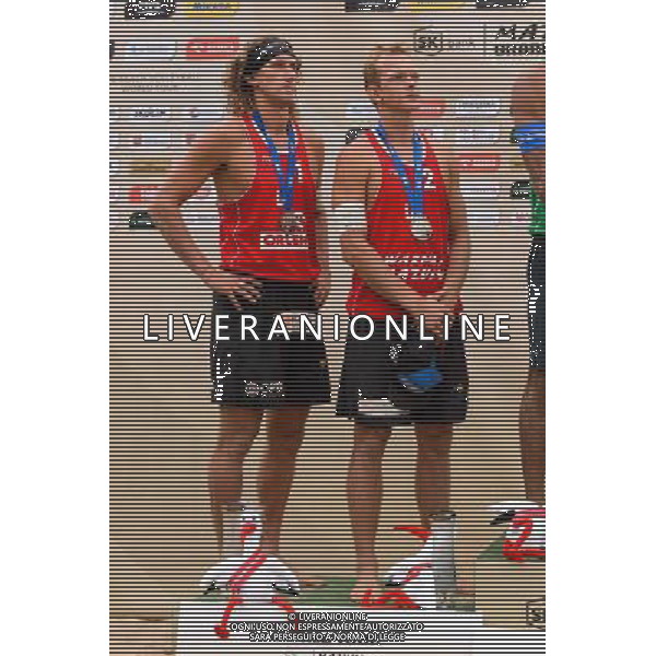 24.08.2014 - Stare Jablonki , siatkowka plazowa , beach volleyball , World Tour , FIVB Stare Jablonki Grand Slam 2014 , Dekoracja mezczyzn N/Z Aleksandrs Samoilovs , Janis Smedins Fot. Mariusz Palczynski / MPAimages.com/NEWSPIX.PL --- Newspix.pl /Agenzia Aldo Liverani sas - ITALY ONLY - EDITORIAL USE ONLY - BEACHVOLLEY PREMIAZIONI *** Local Caption *** www.newspix.pl mail us: info@newspix.pl call us: 0048 022 23 22 222 --- Polish Picture Agency by Ringier Axel Springer Poland