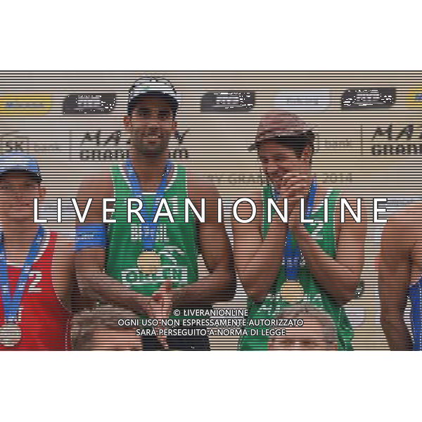 24.08.2014 - Stare Jablonki , siatkowka plazowa , beach volleyball , World Tour , FIVB Stare Jablonki Grand Slam 2014 , Dekoracja mezczyzn N/Z Pedro Solberg Salgado , Alvaro Morais Filho Fot. Mariusz Palczynski / MPAimages.com/NEWSPIX.PL --- Newspix.pl /Agenzia Aldo Liverani sas - ITALY ONLY - EDITORIAL USE ONLY - BEACHVOLLEY PREMIAZIONI *** Local Caption *** www.newspix.pl mail us: info@newspix.pl call us: 0048 022 23 22 222 --- Polish Picture Agency by Ringier Axel Springer Poland