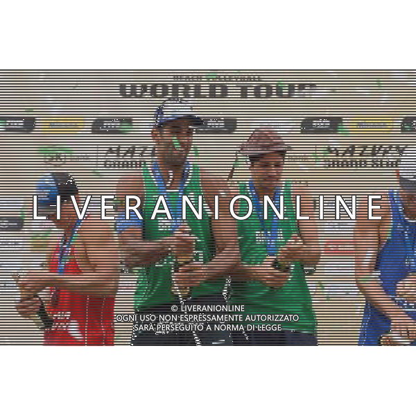 24.08.2014 - Stare Jablonki , siatkowka plazowa , beach volleyball , World Tour , FIVB Stare Jablonki Grand Slam 2014 , Dekoracja mezczyzn N/Z Pedro Solberg Salgado , Alvaro Morais Filho Fot. Mariusz Palczynski / MPAimages.com/NEWSPIX.PL --- Newspix.pl /Agenzia Aldo Liverani sas - ITALY ONLY - EDITORIAL USE ONLY - BEACHVOLLEY PREMIAZIONI *** Local Caption *** www.newspix.pl mail us: info@newspix.pl call us: 0048 022 23 22 222 --- Polish Picture Agency by Ringier Axel Springer Poland