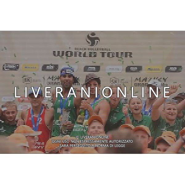 24.08.2014 - Stare Jablonki , siatkowka plazowa , beach volleyball , World Tour , FIVB Stare Jablonki Grand Slam 2014 , Dekoracja mezczyzn N/Z Janis Smedins , Pedro Solberg Salgado , Alvaro Morais Filho Fot. Mariusz Palczynski / MPAimages.com/NEWSPIX.PL --- Newspix.pl /Agenzia Aldo Liverani sas - ITALY ONLY - EDITORIAL USE ONLY - BEACHVOLLEY PREMIAZIONI *** Local Caption *** www.newspix.pl mail us: info@newspix.pl call us: 0048 022 23 22 222 --- Polish Picture Agency by Ringier Axel Springer Poland