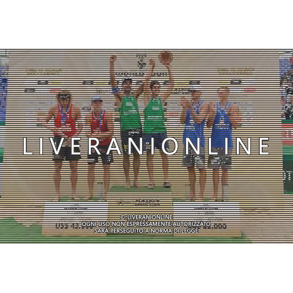 24.08.2014 - Stare Jablonki , siatkowka plazowa , beach volleyball , World Tour , FIVB Stare Jablonki Grand Slam 2014 , Dekoracja mezczyzn N/Z Aleksandrs Samoilovs , Janis Smedins , Pedro Solberg Salgado , Alvaro Morais Filho , Jacob Gibb , Casey Patterson Fot. Mariusz Palczynski / MPAimages.com/NEWSPIX.PL --- Newspix.pl /Agenzia Aldo Liverani sas - ITALY ONLY - EDITORIAL USE ONLY - BEACHVOLLEY PREMIAZIONI *** Local Caption *** www.newspix.pl mail us: info@newspix.pl call us: 0048 022 23 22 222 --- Polish Picture Agency by Ringier Axel Springer Poland