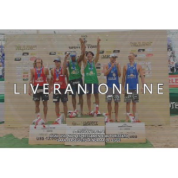 24.08.2014 - Stare Jablonki , siatkowka plazowa , beach volleyball , World Tour , FIVB Stare Jablonki Grand Slam 2014 , Dekoracja mezczyzn N/Z Aleksandrs Samoilovs , Janis Smedins , Pedro Solberg Salgado , Alvaro Morais Filho , Jacob Gibb , Casey Patterson Fot. Mariusz Palczynski / MPAimages.com/NEWSPIX.PL --- Newspix.pl /Agenzia Aldo Liverani sas - ITALY ONLY - EDITORIAL USE ONLY - BEACHVOLLEY PREMIAZIONI *** Local Caption *** www.newspix.pl mail us: info@newspix.pl call us: 0048 022 23 22 222 --- Polish Picture Agency by Ringier Axel Springer Poland