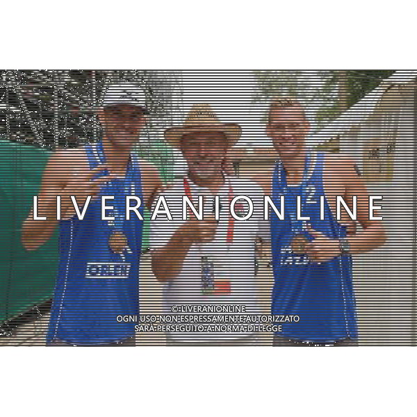 24.08.2014 - Stare Jablonki , siatkowka plazowa , beach volleyball , World Tour , FIVB Stare Jablonki Grand Slam 2014 , Dekoracja mezczyzn N/Z Jacob Gibb , Wlodzimierz Brodiuk , Casey Patterson Fot. Mariusz Palczynski / MPAimages.com/NEWSPIX.PL --- Newspix.pl /Agenzia Aldo Liverani sas - ITALY ONLY - EDITORIAL USE ONLY - BEACHVOLLEY PREMIAZIONI *** Local Caption *** www.newspix.pl mail us: info@newspix.pl call us: 0048 022 23 22 222 --- Polish Picture Agency by Ringier Axel Springer Poland