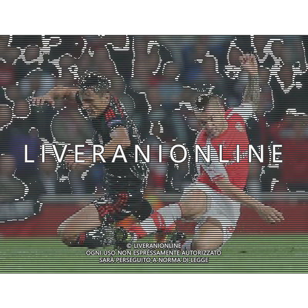 Arsenal\'s Mathieu Debuchy takes down Mustafa Pektemek of Besiktas Photo by Kieran Galvin/CameraSport Football - UEFA Champions League Qualifying Play-Offs Round Second Leg - Arsenal v Besiktas - Wednesday 27th August 2014 - Emirates Stadium - London © CameraSport - 43 Linden Ave. Countesthorpe. Leicester. England. LE8 5PG - Tel: +44 (0) 116 277 4147 - admin@camerasport.com - www.camerasport.com /Agenzia Aldo Liverani sas - ITALY ONLY - EDITORIAL USE ONLY
