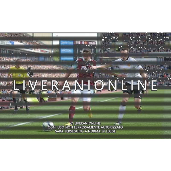 Burnley\'s Lukas Jutkiewicz vies for possession with Manchester United\'s Phil Jones Photographer Chris Vaughan/CameraSport Football - Barclays Premiership - Burnley v Manchester United - Saturday 30th August 2014 - Turf Moor - Burnley © CameraSport - 43 Linden Ave. Countesthorpe. Leicester. England. LE8 5PG - Tel: +44 (0) 116 277 4147 - admin@camerasport.com - www.camerasport.com /Agenzia Aldo Liverani sas - ITALY ONLY - EDITORIAL USE ONLY