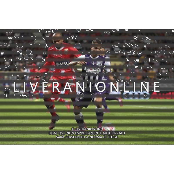 Wissam Ben Yedder / Aldo Angoula - 30.08.2014 - Toulouse / Evian Thonon - 4eme journee de Ligue 1 - Photo : Manuel Blondeau / Icon Sport AG ALDO LIVERANI SAS ONLY ITALY