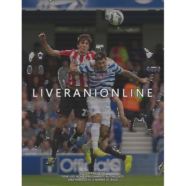 Queens Park Rangers\' Charlie Austin battles with Sunderland\'s Santiago Vergini Photographer Ashley Western/CameraSport Football - Barclays Premiership - Queens Park Rangers v Sunderland - Saturday 30th August 2014 - Loftus Road - London © CameraSport - 43 Linden Ave. Countesthorpe. Leicester. England. LE8 5PG - Tel: +44 (0) 116 277 4147 - admin@camerasport.com - www.camerasport.com ag aldo liverani sas only italy