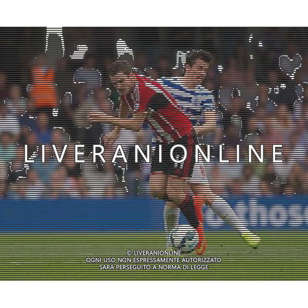 Sunderland\'s Adam Johnson is tackled by Queens Park Rangers\' Joey Barton Photographer Ashley Western/CameraSport Football - Barclays Premiership - Queens Park Rangers v Sunderland - Saturday 30th August 2014 - Loftus Road - London © CameraSport - 43 Linden Ave. Countesthorpe. Leicester. England. LE8 5PG - Tel: +44 (0) 116 277 4147 - admin@camerasport.com - www.camerasport.com ag aldo liverani sas only italy