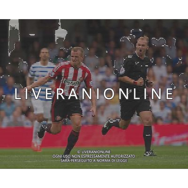Sunderland\'s Lee Cattermole protests at Queens Park Rangers\' Jordon Mutch Photographer Ashley Western/CameraSport Football - Barclays Premiership - Queens Park Rangers v Sunderland - Saturday 30th August 2014 - Loftus Road - London © CameraSport - 43 Linden Ave. Countesthorpe. Leicester. England. LE8 5PG - Tel: +44 (0) 116 277 4147 - admin@camerasport.com - www.camerasport.com ag aldo liverani sas only italy