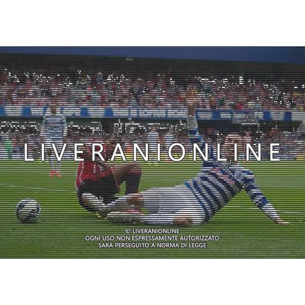 Queens Park Rangers\' Jordon Mutch is tackled by Sunderland\'s Patrick van Aanholt Photographer Ashley Western/CameraSport Football - Barclays Premiership - Queens Park Rangers v Sunderland - Saturday 30th August 2014 - Loftus Road - London © CameraSport - 43 Linden Ave. Countesthorpe. Leicester. England. LE8 5PG - Tel: +44 (0) 116 277 4147 - admin@camerasport.com - www.camerasport.com ag aldo liverani sas only italy