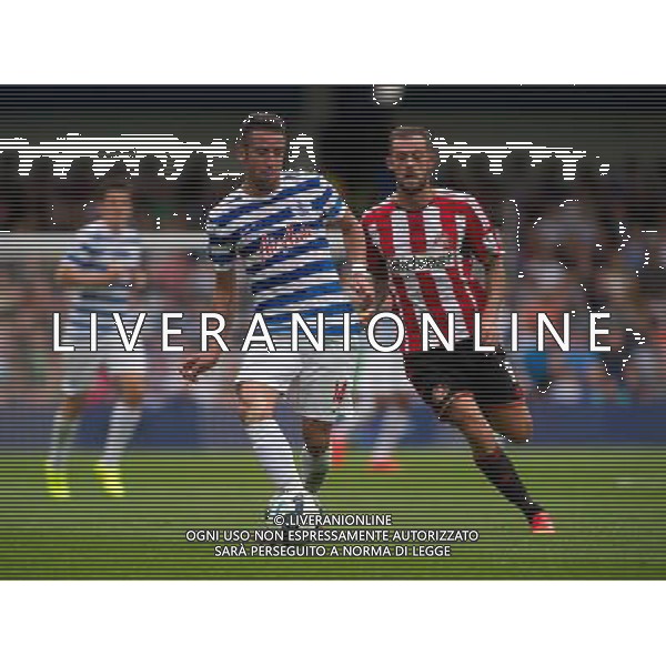 Queens Park Rangers\' Mauricio Isla holds off the challenge from Sunderland\'s Steven Fletcher Photographer Ashley Western/CameraSport Football - Barclays Premiership - Queens Park Rangers v Sunderland - Saturday 30th August 2014 - Loftus Road - London © CameraSport - 43 Linden Ave. Countesthorpe. Leicester. England. LE8 5PG - Tel: +44 (0) 116 277 4147 - admin@camerasport.com - www.camerasport.com ag aldo liverani sas only italy