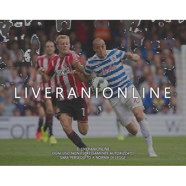 Queens Park Rangers\' Bobby Zamora vies for possession with Sunderland\'s Sebastian Larsson Photographer Ashley Western/CameraSport Football - Barclays Premiership - Queens Park Rangers v Sunderland - Saturday 30th August 2014 - Loftus Road - London © CameraSport - 43 Linden Ave. Countesthorpe. Leicester. England. LE8 5PG - Tel: +44 (0) 116 277 4147 - admin@camerasport.com - www.camerasport.com ag aldo liverani sas only italy