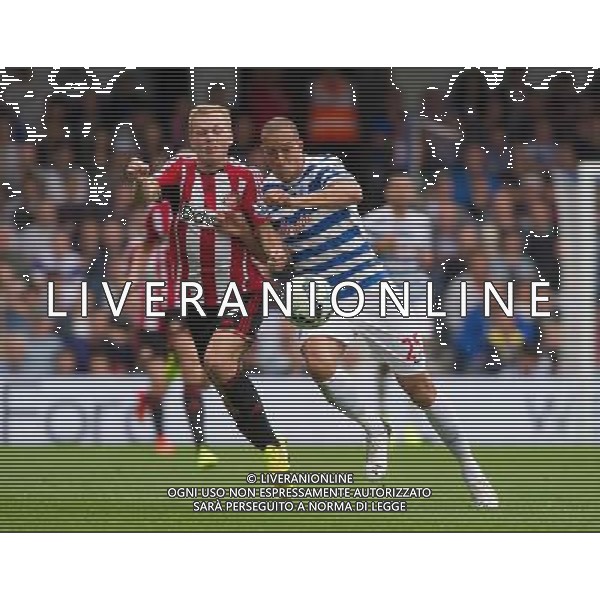 Queens Park Rangers\' Bobby Zamora vies for possession with Sunderland\'s Sebastian Larsson Photographer Ashley Western/CameraSport Football - Barclays Premiership - Queens Park Rangers v Sunderland - Saturday 30th August 2014 - Loftus Road - London © CameraSport - 43 Linden Ave. Countesthorpe. Leicester. England. LE8 5PG - Tel: +44 (0) 116 277 4147 - admin@camerasport.com - www.camerasport.com ag aldo liverani sas only italy