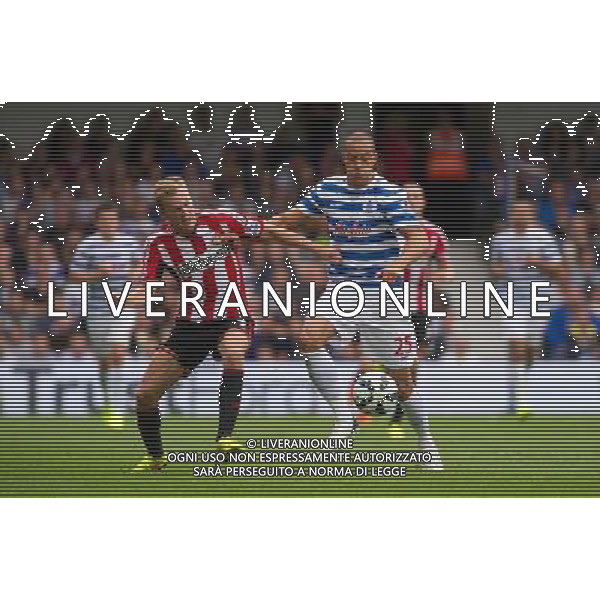 Queens Park Rangers\' Bobby Zamora vies for possession with Sunderland\'s Sebastian Larsson Photographer Ashley Western/CameraSport Football - Barclays Premiership - Queens Park Rangers v Sunderland - Saturday 30th August 2014 - Loftus Road - London © CameraSport - 43 Linden Ave. Countesthorpe. Leicester. England. LE8 5PG - Tel: +44 (0) 116 277 4147 - admin@camerasport.com - www.camerasport.com ag aldo liverani sas only italy